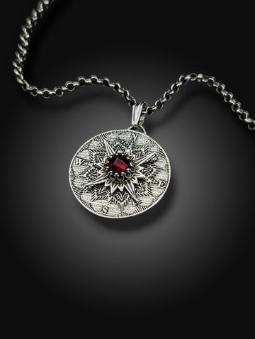 spinning sterling compass necklace with garnet