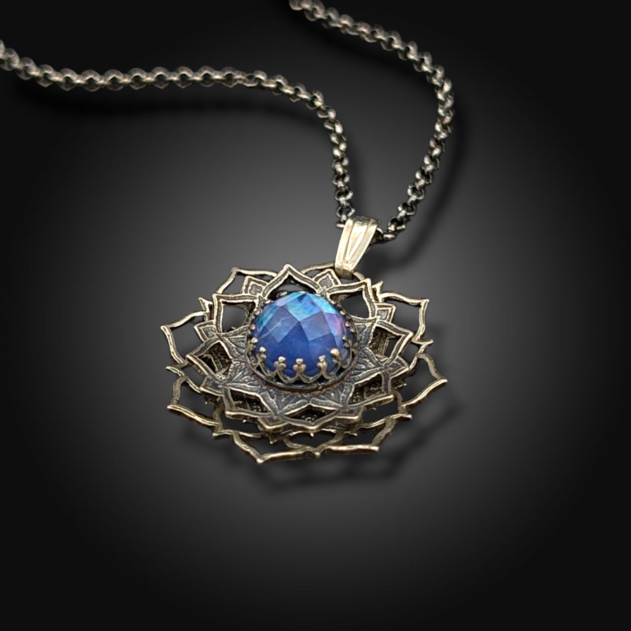 OCEANIC ORBIT: Hand-Etched Spinning Mandala Necklace with Mother of Pearl